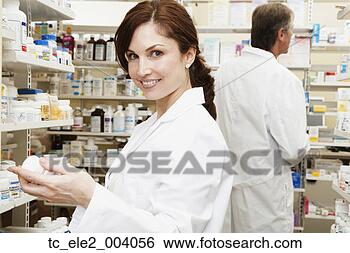 Stock Photo - female and male 
pharmacists in 
pharmacy. fotosearch 
- search stock 
photos, pictures, 
images, and photo 
clipart