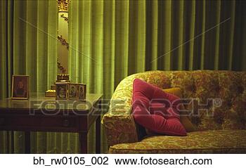 Stock Photo - sofa next to end 
table with photographs. 
fotosearch - search 
stock photos, 
pictures, images, 
and photo clipart