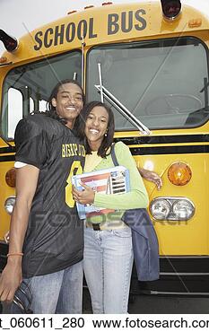 Stock Photography - young african 
man in football 
uniform with girlfriend 
next to school. 
fotosearch - search 
stock photos, 
pictures, images, 
and photo clipart