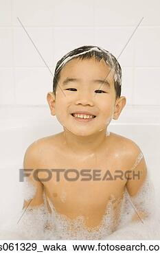 Stock Photography - young asian boy 
smiling in bubble 
bath. fotosearch 
- search stock 
photos, pictures, 
images, and photo 
clipart