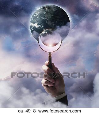 Stock Photo - businessman holding 
magnifying glass 
up to planet earth. 
fotosearch - search 
stock photos, 
pictures, images, 
and photo clipart