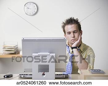 Stock Photography - businessman working 
at desk. fotosearch 
- search stock 
photos, pictures, 
images, and photo 
clipart