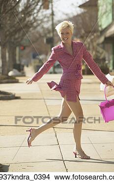 Stock Photo - businesswoman 
running  on sidewalk. 
fotosearch - search 
stock photos, 
pictures, images, 
and photo clipart
