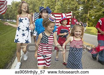 Picture - children walking 
in fourth of july 
parade. fotosearch 
- search stock 
photos, pictures, 
images, and photo 
clipart