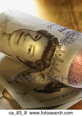 Stock Photo - close up of british 
pounds. fotosearch 
- search stock 
photos, pictures, 
images, and photo 
clipart