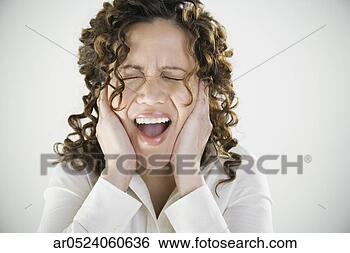 Stock Photo - close up of woman 
yelling and covering 
ears. fotosearch 
- search stock 
photos, pictures, 
images, and photo 
clipart
