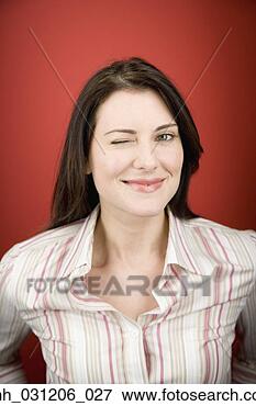 Picture - close up of woman 
winking. fotosearch 
- search stock 
photos, pictures, 
images, and photo 
clipart