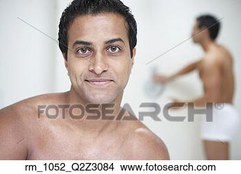 Stock Photo - indian man with 
bare chest smiling 
while man in underwear 
tests. fotosearch 
- search stock 
photos, pictures, 
images, and photo 
clipart
