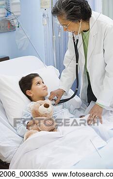 Stock Image - senior female 
doctor using stethoscope 
on girl in hospital 
bed. fotosearch 
- search stock 
photos, pictures, 
images, and photo 
clipart