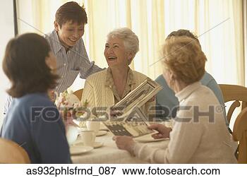 Picture - senior woman talking 
and laughing with 
friends. fotosearch 
- search stock 
photos, pictures, 
images, and photo 
clipart