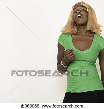 Stock Photo - studio shot of 
african woman 
wearing blonde 
wig. fotosearch 
- search stock 
photos, pictures, 
images, and photo 
clipart