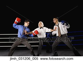 Stock Image - two businessmen 
being held apart 
in boxing ring. 
fotosearch - search 
stock photos, 
pictures, images, 
and photo clipart