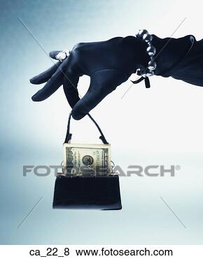 Stock Photo - woman's gloved 
and jeweled hand 
holding purse 
with us hundred 
dollar. fotosearch 
- search stock 
photos, pictures, 
images, and photo 
clipart
