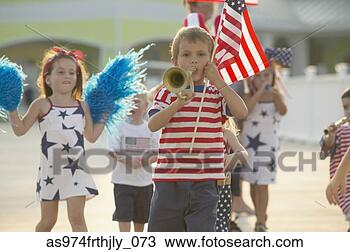 Stock Photo - young children 
walking in fourth 
of july parade. 
fotosearch - search 
stock photos, 
pictures, images, 
and photo clipart