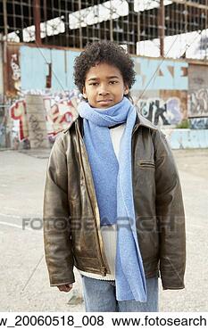 Stock Photo - african boy wearing 
jacket and scarf 
in urban scene. 
fotosearch - search 
stock photos, 
pictures, images, 
and photo clipart