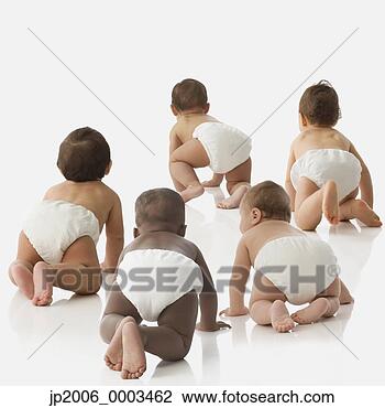Stock Photo - rear view studio 
shot of babies 
crawling. fotosearch 
- search stock 
photos, pictures, 
images, and photo 
clipart