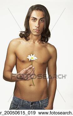 Stock Photograph - studio shot of 
bare chested middle 
eastern man holding 
flower. fotosearch 
- search stock 
photos, pictures, 
images, and photo 
clipart