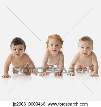 Stock Photo - studio shot of 
three babies in 
diapers crawling. 
fotosearch - search 
stock photos, 
pictures, images, 
and photo clipart