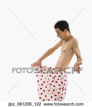Stock Photo - hispanic man looking 
down into boxer 
shorts. fotosearch 
- search stock 
photos, pictures, 
images, and photo 
clipart