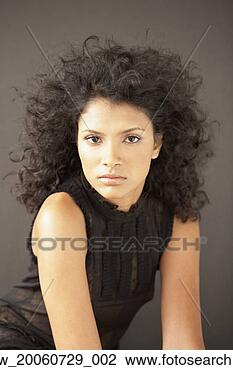 Stock Photo - portrait of indian 
woman with curly 
hair. fotosearch 
- search stock 
photos, pictures, 
images, and photo 
clipart