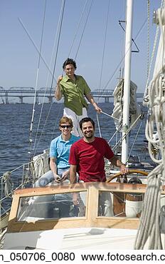 Stock Photography - portrait of three 
men on sailboat. 
fotosearch - search 
stock photos, 
pictures, images, 
and photo clipart