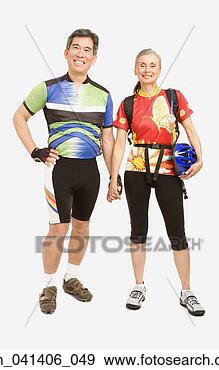 Stock Photograph - senior couple 
wearing bicycling 
gear. fotosearch 
- search stock 
photos, pictures, 
images, and photo 
clipart
