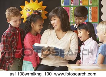 Stock Photography - asian female teacher 
reading to students. 
fotosearch - search 
stock photos, 
pictures, images, 
and photo clipart