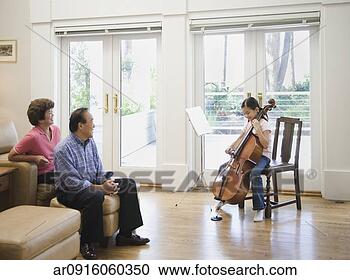 Stock Photography - asian girl playing 
cello for grandparents. 
fotosearch - search 
stock photos, 
pictures, images, 
and photo clipart