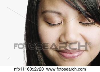 Stock Photography - asian woman smiling 
with eyes closed. 
fotosearch - search 
stock photos, 
pictures, images, 
and photo clipart