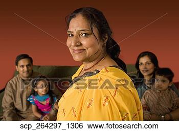 Stock Photo - multi-generational 
indian family 
in traditional 
dress. fotosearch 
- search stock 
photos, pictures, 
images, and photo 
clipart