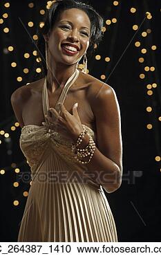 Stock Photography - portrait of african 
woman wearing 
evening dress. 
fotosearch - search 
stock photos, 
pictures, images, 
and photo clipart