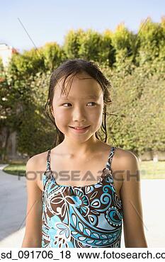 Stock Photo - portrait of asian 
girl in bathing 
suit. fotosearch 
- search stock 
photos, pictures, 
images, and photo 
clipart