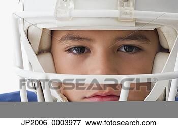 Picture - close up of hispanic 
boy wearing football 
helmet. fotosearch 
- search stock 
photos, pictures, 
images, and photo 
clipart