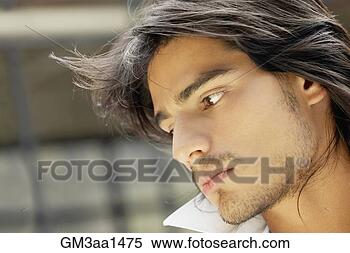 Stock Image - close up of young 
hispanic man looking 
down. fotosearch 
- search stock 
photos, pictures, 
images, and photo 
clipart