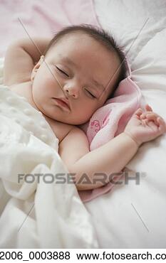 Stock Photo - high angle view 
of sleeping baby. 
fotosearch - search 
stock photos, 
pictures, images, 
and photo clipart