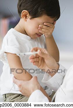 Stock Photo - hispanic boy crying 
over vaccination 
shot. fotosearch 
- search stock 
photos, pictures, 
images, and photo 
clipart