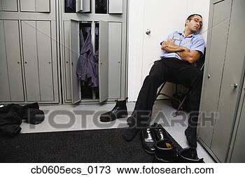 Stock Photo - hispanic male 
mechanic sleeping 
in locker room. 
fotosearch - search 
stock photos, 
pictures, images, 
and photo clipart