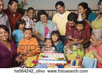 Stock Photo - large hispanic 
family celebrating 
birthday. fotosearch 
- search stock 
photos, pictures, 
images, and photo 
clipart
