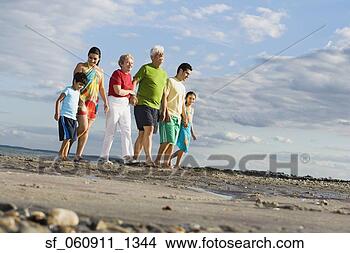 Stock Photo - surface shot of 
hispanic family 
walking on beach. 
fotosearch - search 
stock photos, 
pictures, images, 
and photo clipart