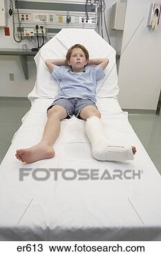 Stock Photo - young boy with 
broken leg laying 
in hospital bed. 
fotosearch - search 
stock photos, 
pictures, images, 
and photo clipart