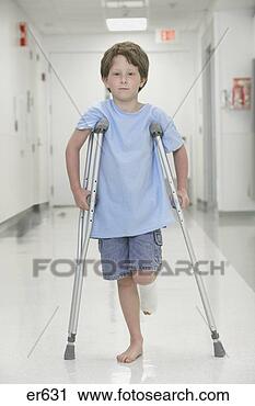Stock Photography - young boy with 
broken leg walking 
on crutches. fotosearch 
- search stock 
photos, pictures, 
images, and photo 
clipart