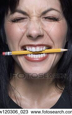 Close up of woman biting pencil
View Large Photo Image Stock Photo - close up of woman
biting pencil.
fotosearch - search
stock photos,
pictures, images,
and photo clipart
