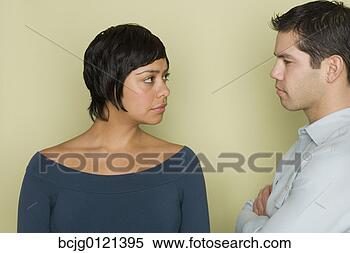 Stock Image - hispanic couple 
looking angry. 
fotosearch - search 
stock photos, 
pictures, images, 
and photo clipart
