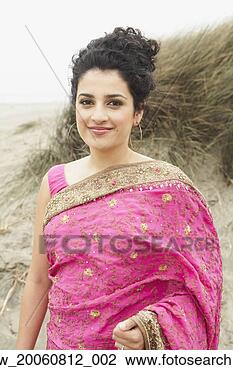 Stock Photo - portrait of indian 
woman in traditional 
dress. fotosearch 
- search stock 
photos, pictures, 
images, and photo 
clipart