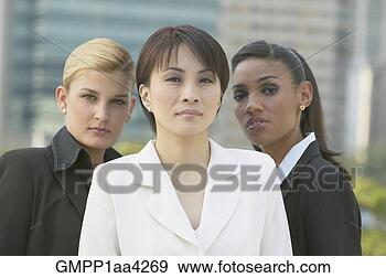 Stock Photograph - three multi-ethnic 
businesswomen 
outdoors. fotosearch 
- search stock 
photos, pictures, 
images, and photo 
clipart