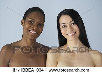 Stock Photography - two multi-ethnic 
women with bare 
shoulders. fotosearch 
- search stock 
photos, pictures, 
images, and photo 
clipart
