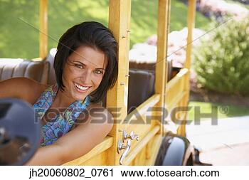 Stock Photography - young woman driving 
old fashioned 
car. fotosearch 
- search stock 
photos, pictures, 
images, and photo 
clipart