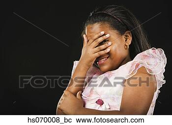 Stock Photography - african girl peeking 
through fingers. 
fotosearch - search 
stock photos, 
pictures, images, 
and photo clipart