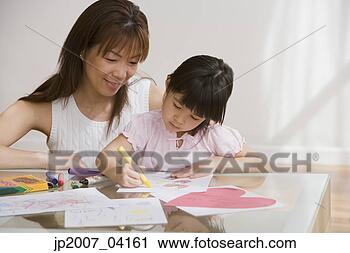 Stock Photography - asian mother watching 
daughter color. 
fotosearch - search 
stock photos, 
pictures, images, 
and photo clipart
