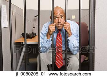 Stock Photography - businessman in 
cubicle behind 
bars. fotosearch 
- search stock 
photos, pictures, 
images, and photo 
clipart